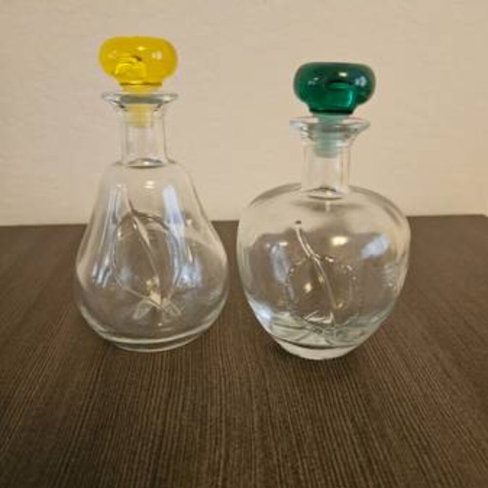 Two glass bottles with stoppers